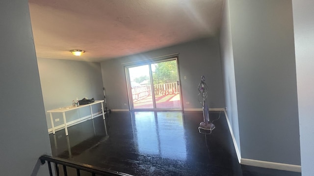 8027 Northway Dr, Hanover Park, IL 60133 - interior space with baseboards and finished concrete flooring