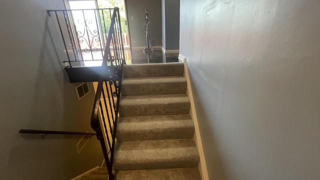 8027 Northway Dr, Hanover Park, IL 60133 - stairway with carpet floors