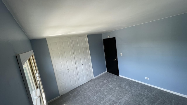 8027 Northway Dr, Hanover Park, IL 60133 - unfurnished bedroom with a closet and carpet floors