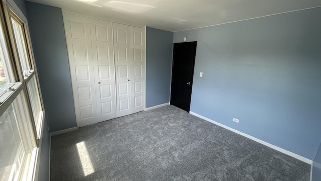 8027 Northway Dr, Hanover Park, IL 60133 - unfurnished bedroom with a closet and carpet flooring