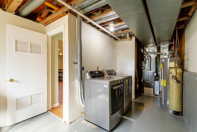1150 Attleboro Ct, Schaumburg, IL 60193 - washroom with washing machine and dryer, heating unit, and gas water heater