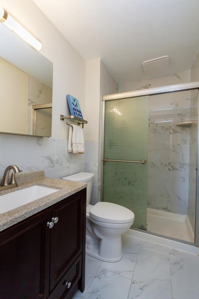 1150 Attleboro Ct, Schaumburg, IL 60193 - full bathroom with marble finish floors, vanity, a stall shower, and tile walls