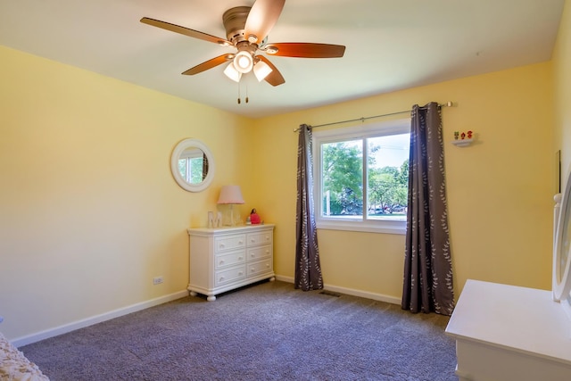 1150 Attleboro Ct, Schaumburg, IL 60193 - bedroom featuring multiple windows, dark carpet, and a ceiling fan