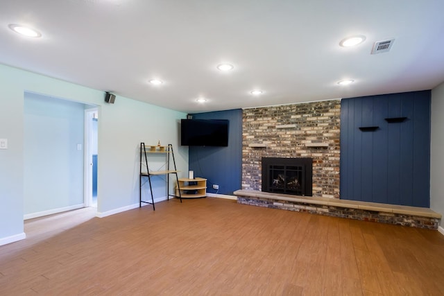 1150 Attleboro Ct, Schaumburg, IL 60193 - unfurnished living room featuring wood finished floors, a fireplace, and recessed lighting
