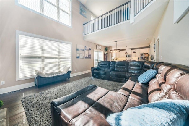 1504 Jacobs Blvd, Champaign, IL 61822 - living room with a towering ceiling and dark wood-type flooring