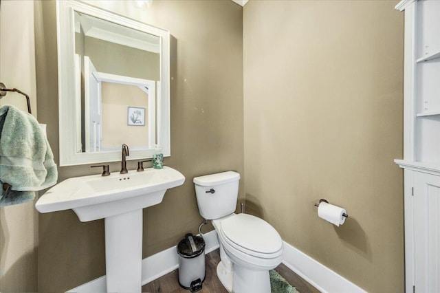 1504 Jacobs Blvd, Champaign, IL 61822 - half bathroom with toilet and wood finished floors