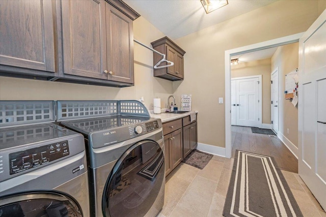 1504 Jacobs Blvd, Champaign, IL 61822 - washroom featuring washing machine and clothes dryer and cabinet space