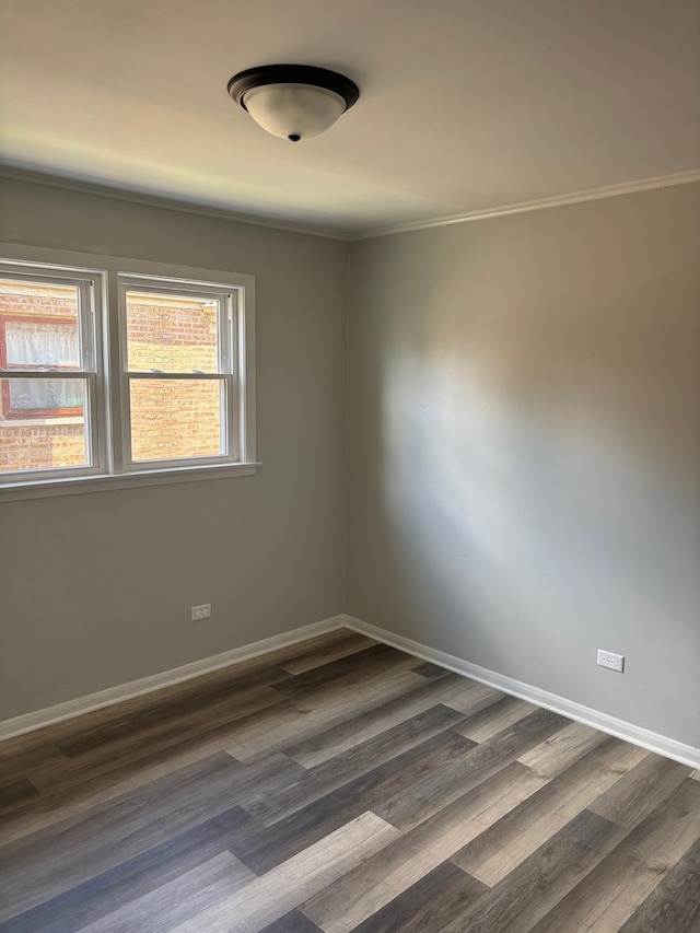 14248 Avalon Ave, Dolton, IL 60419 - spare room featuring dark wood-style flooring and baseboards