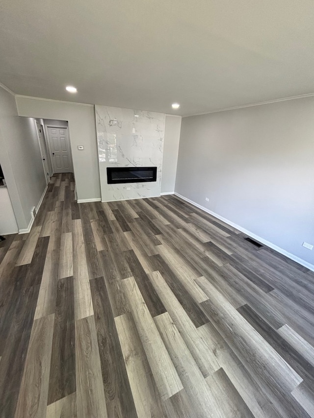 14248 Avalon Ave, Dolton, IL 60419 - unfurnished living room featuring dark wood finished floors, a fireplace, and recessed lighting