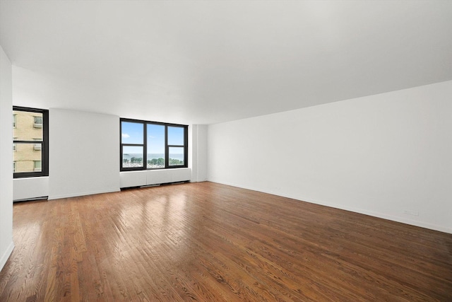 3150 N Lake Shore Dr Unit 14E, Chicago, IL 60657 - unfurnished room with wood finished floors and baseboards