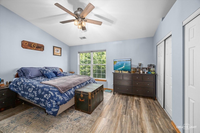 503 Huntington Ct Unit 503, Oswego, IL 60543 - bedroom with hardwood / wood-style floors, lofted ceiling, and ceiling fan