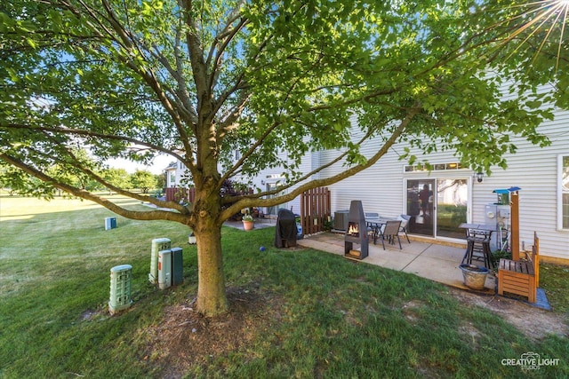 503 Huntington Ct Unit 503, Oswego, IL 60543 - view of green lawn with a patio area