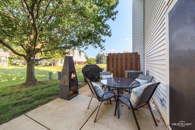 503 Huntington Ct Unit 503, Oswego, IL 60543 - view of patio / terrace with a grill and outdoor dining space