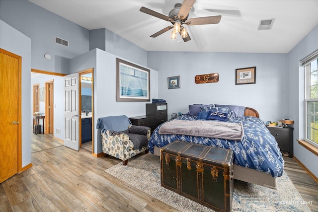 503 Huntington Ct Unit 503, Oswego, IL 60543 - bedroom with lofted ceiling, wood finished floors, and a ceiling fan