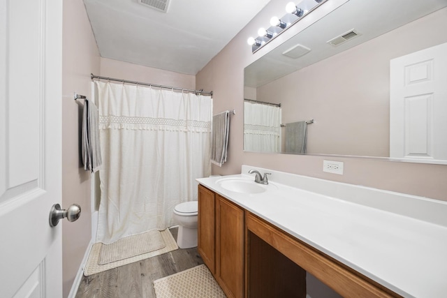 630 Legend Ln, Mchenry, IL 60050 - full bathroom with vanity, wood finished floors, and a shower with shower curtain