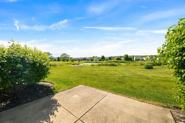 630 Legend Ln, Mchenry, IL 60050 - view of green lawn featuring a patio area