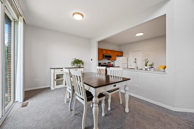 630 Legend Ln, Mchenry, IL 60050 - dining area with carpet flooring and plenty of natural light