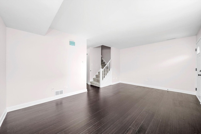 10417 Massasoit Ave, Oak Lawn, IL 60453 - unfurnished living room with dark wood finished floors and stairway