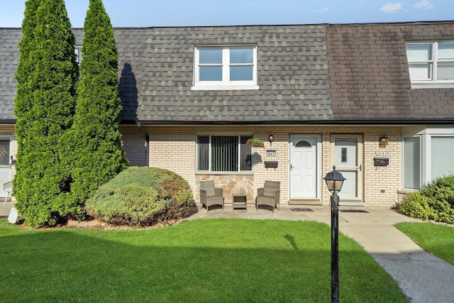 10417 Massasoit Ave, Oak Lawn, IL 60453 - multi unit property with a shingled roof, mansard roof, a front yard, and brick siding