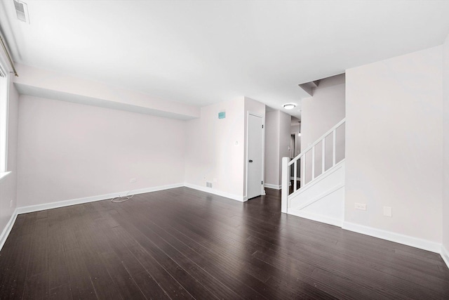 10417 Massasoit Ave, Oak Lawn, IL 60453 - unfurnished living room featuring dark wood-style floors and stairway