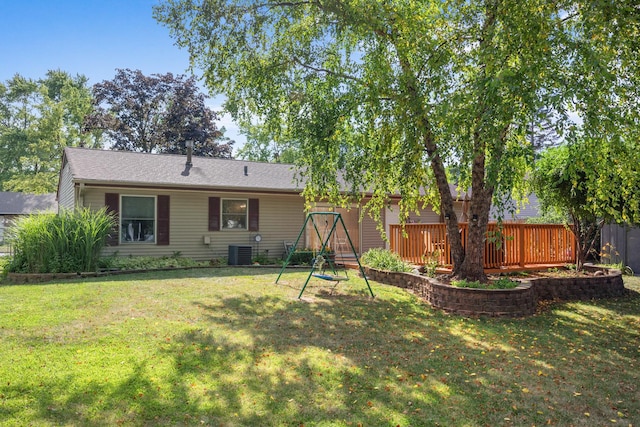 211 David Dr, Streamwood, IL 60107 - back of property featuring a lawn and a deck