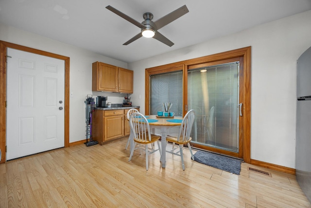 211 David Dr, Streamwood, IL 60107 - dining area with light wood-style floors and a ceiling fan