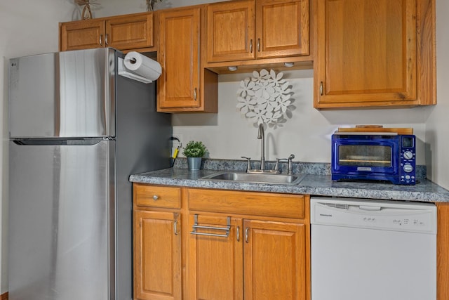 211 David Dr, Streamwood, IL 60107 - kitchen with freestanding refrigerator, white dishwasher, and brown cabinets