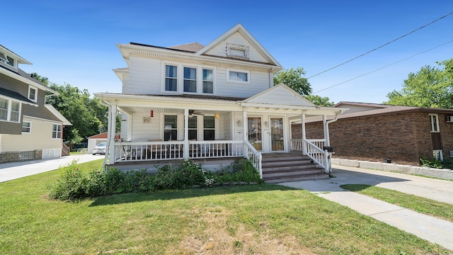 611 S Hennepin Ave, Dixon, IL 61021 - view of front of property featuring a porch and a front lawn
