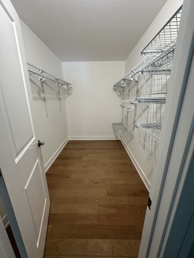 9197 N Rd Unit C, Palos Hills, IL 60465 - walk in closet featuring wood finished floors