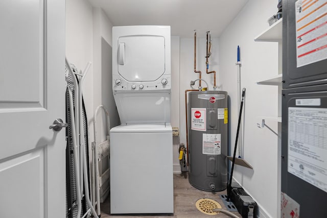 9197 N Rd Unit C, Palos Hills, IL 60465 - washroom featuring stacked washing machine and dryer, water heater, wood finished floors, and heating unit