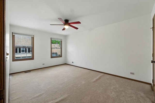 2S772 Timber Dr, Warrenville, IL 60555 - carpeted empty room with a ceiling fan and baseboards