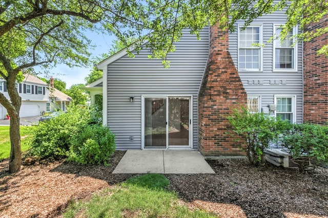 2S772 Timber Dr, Warrenville, IL 60555 - back of property with a patio