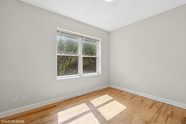 4610 N Monticello Ave Unit 3E, Chicago, IL 60625 - unfurnished room with baseboards and light wood-type flooring