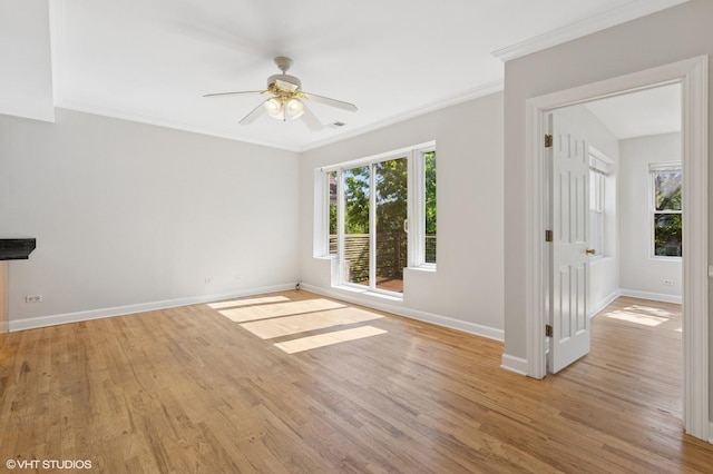4610 N Monticello Ave Unit 3E, Chicago, IL 60625 - empty room with wood finished floors, ceiling fan, and ornamental molding