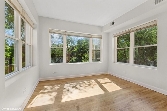4610 N Monticello Ave Unit 3E, Chicago, IL 60625 - spare room featuring plenty of natural light and light wood-type flooring