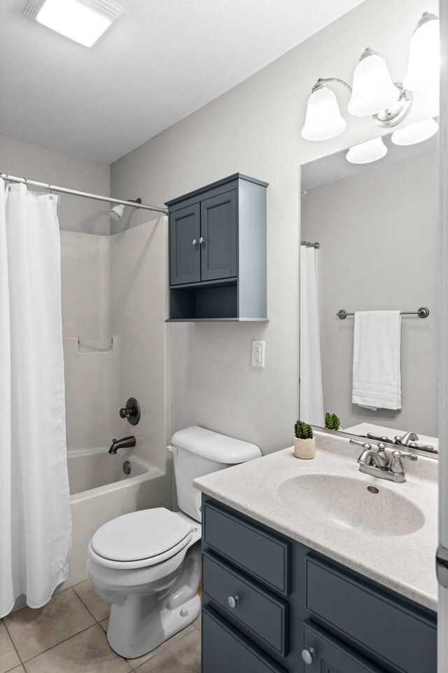 1312 Wicklow Dr, Bloomington, IL 61705 - bathroom with vanity, tile patterned flooring, and shower / bath combo with shower curtain