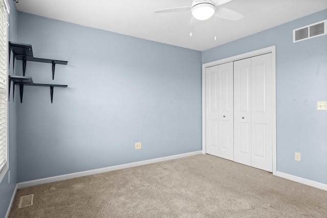 1312 Wicklow Dr, Bloomington, IL 61705 - unfurnished bedroom with carpet floors, a closet, and ceiling fan