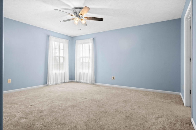 1312 Wicklow Dr, Bloomington, IL 61705 - empty room featuring carpet and a ceiling fan