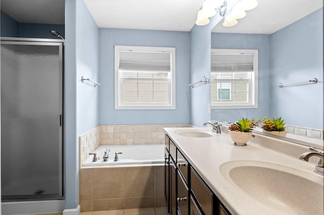 1312 Wicklow Dr, Bloomington, IL 61705 - full bath featuring a stall shower, double vanity, a bath, and tile patterned floors