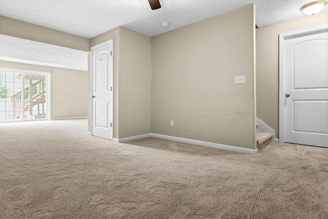 1312 Wicklow Dr, Bloomington, IL 61705 - carpeted spare room with ceiling fan and a smoke detector