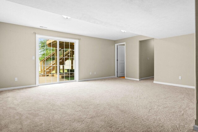 1312 Wicklow Dr, Bloomington, IL 61705 - carpeted empty room featuring baseboards