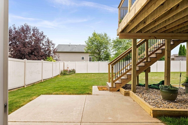 1312 Wicklow Dr, Bloomington, IL 61705 - fenced backyard with a patio area and stairs