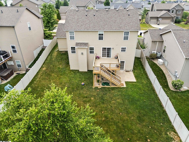 1312 Wicklow Dr, Bloomington, IL 61705 - rear view of property with a residential view, stairs, a fenced backyard, and a shingled roof