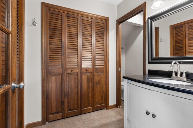 4113 Eaton Dr, Rockford, IL 61114 - bathroom with a closet, vanity, and tile patterned flooring