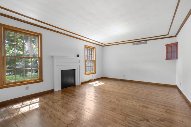 4113 Eaton Dr, Rockford, IL 61114 - unfurnished living room with hardwood / wood-style floors, a fireplace, and crown molding