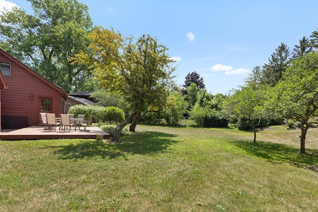 4113 Eaton Dr, Rockford, IL 61114 - view of green lawn featuring a deck