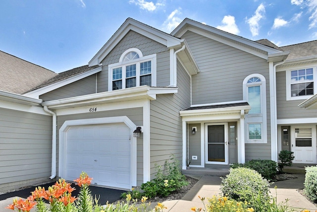 654 Kingsbridge Dr, Carol Stream, IL 60188 - multi unit property featuring a shingled roof