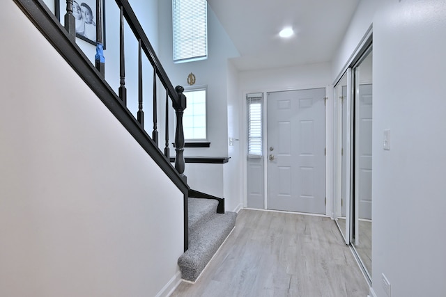 654 Kingsbridge Dr, Carol Stream, IL 60188 - foyer with wood finished floors and stairs