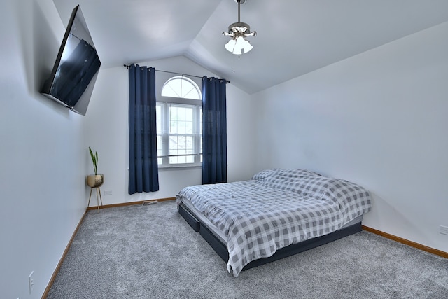 654 Kingsbridge Dr, Carol Stream, IL 60188 - carpeted bedroom with lofted ceiling and baseboards