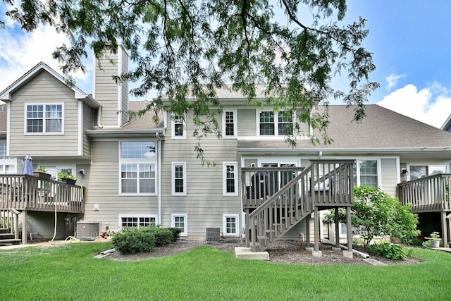 654 Kingsbridge Dr, Carol Stream, IL 60188 - rear view of property with a wooden deck, stairs, and a yard
